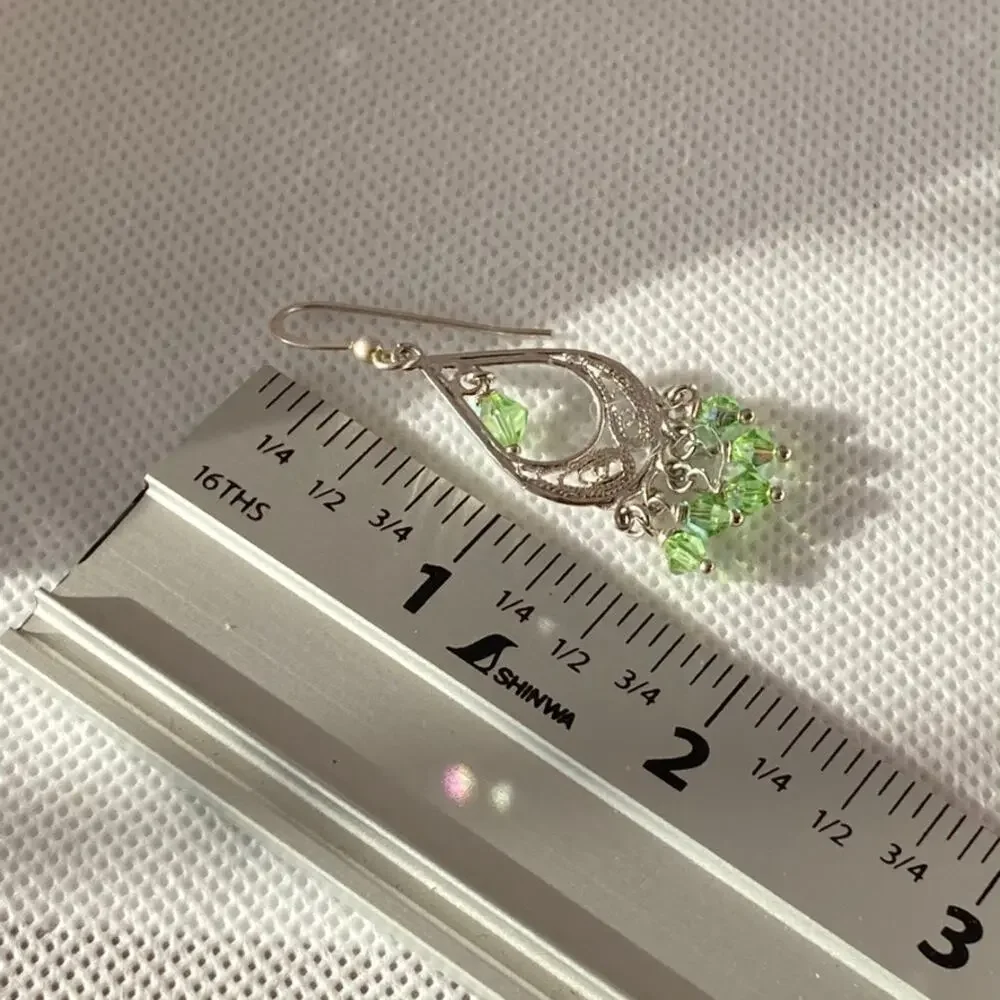 Delicate silver tone and leaf green chandelier earrings